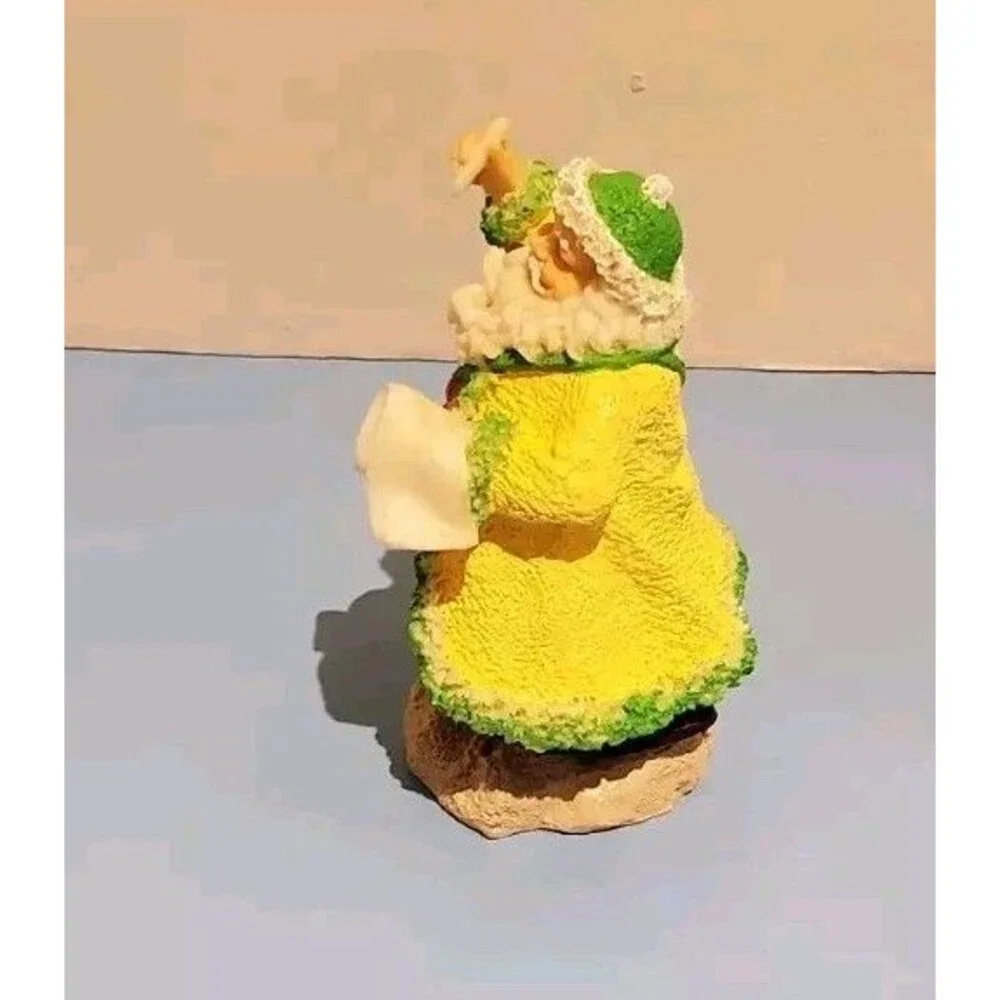 Santa Claus Naughty & Nice List Christmas Figurine In Pastel Yellow Robe Xmas